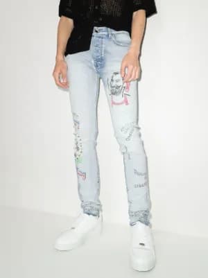 x Zig Zag motif-print skinny jeans by AMIRI