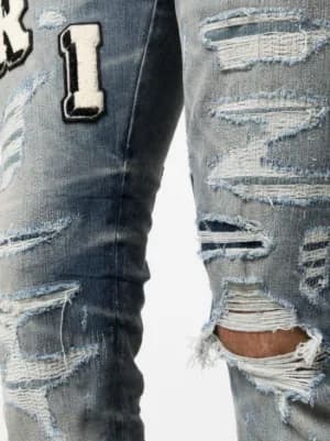 Varsity ripped skinny jeans 6