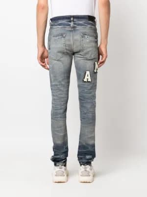 Varsity ripped skinny jeans 5