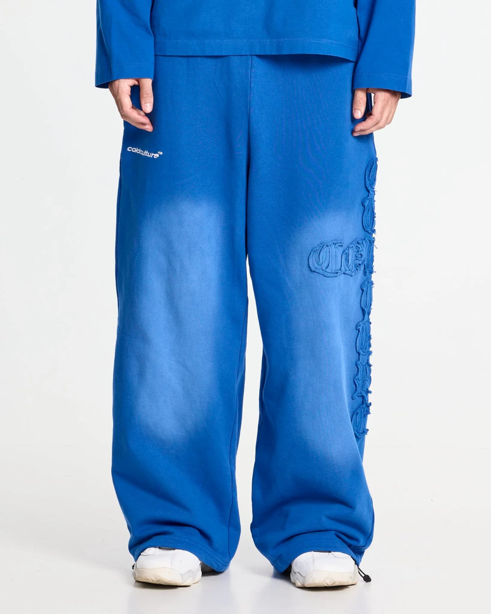 CROSSED SWEATPANTS BLUE by COLD CULTURE